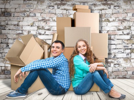 Helper transporting household items with a man and van service