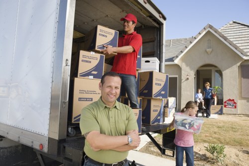 Man and van service loading items for a Lambeth removal