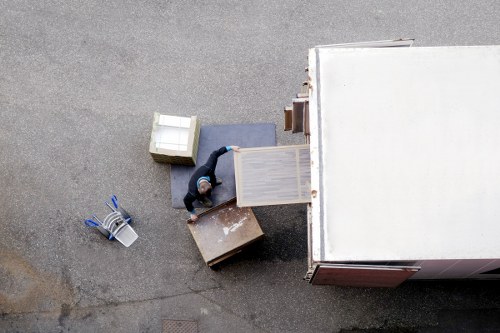 Person loading boxes into a van in Lambeth for a local move
