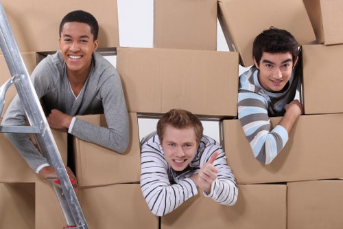 Packed moving boxes and furniture prepared for Lambeth removals