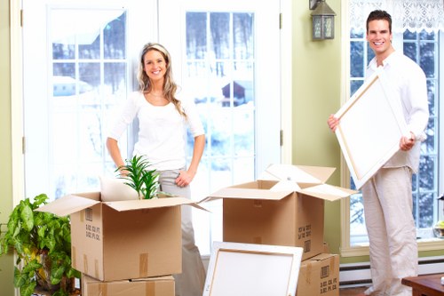 Packed office equipment and furniture ready for relocation services in Lambeth