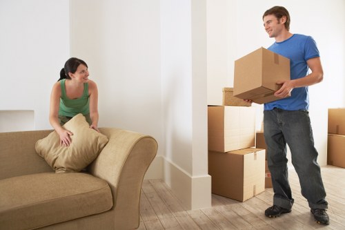Local movers handling commercial furniture in a Lambeth street